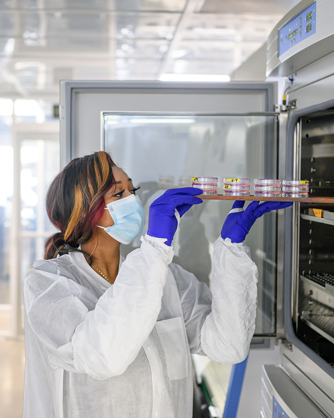 HeartWorks Lab technician transferring stem cells to storage.