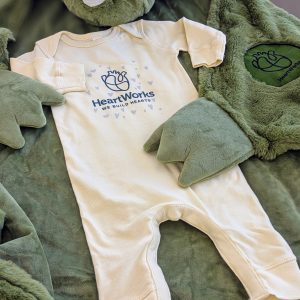 Baby Onesie wrapped in cozy stuffed animal robe