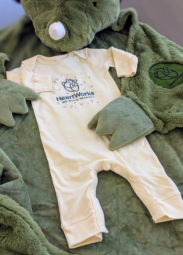 Baby Onesie wrapped in cozy stuffed animal robe