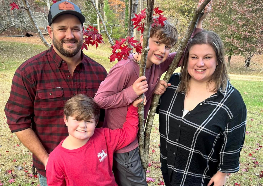 Tolar Family Portrait by tree