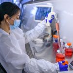Lab technician researching regenerative medicine